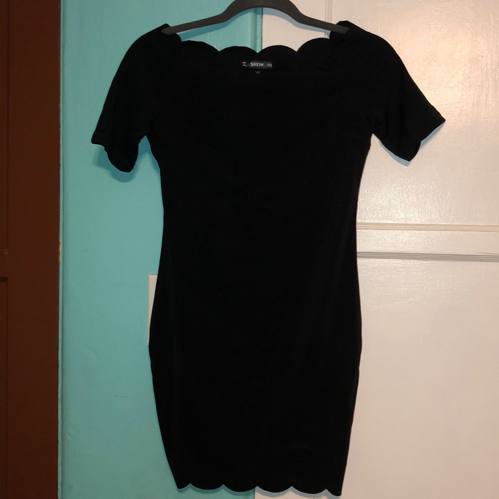 Scalloped mini dress.